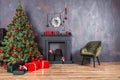 Beautiful holiday decorated room with Christmas tree with presents under it Royalty Free Stock Photo