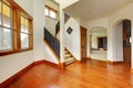 Beautiful home entrance with wood floor. New luxury home interior.