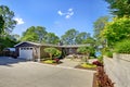 Beautiful home with garage, lake view and large front yard. Royalty Free Stock Photo