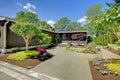 Beautiful home with garage, lake view and large front yard. Royalty Free Stock Photo