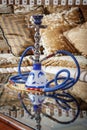 Beautiful hookah standing on a table in the eastern interior Royalty Free Stock Photo