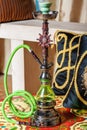 Beautiful hookah standing on a table in the eastern interior
