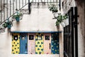 Beautiful horizontal shot of painted electricity boxes in a narrow street in Split, Croatia Royalty Free Stock Photo