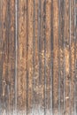 A texture of brown boards with knots and resin painted with impregnation for wood. Vertical