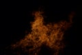 Beautiful hot burning tall flames from bonfire on dark winter Royalty Free Stock Photo