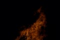 Beautiful hot burning tall flames from bonfire on dark winter background Royalty Free Stock Photo