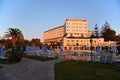 Beautiful hotel - beach resort at sunset. Summer background for travel and holidays. Greece Crete.