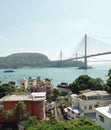 Beautiful house, blue sea, boats and Tsing Ma bridge, Sham Tseng, Hong Kong landscape