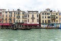 Beautiful house and canal with ships at Venice, Italy 2015