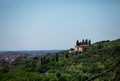 Beautiful house on the hill between the trees near the city Royalty Free Stock Photo