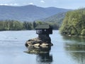 A beautiful house in the middle of the river, built on stone. Royalty Free Stock Photo