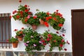 Beautiful house with with pots on their windows Royalty Free Stock Photo