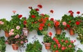 Beautiful house with with pots on their windows Royalty Free Stock Photo