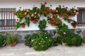 Beautiful house with with pots on their windows Royalty Free Stock Photo