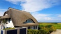 House with Roof ree or thatch on the beach Royalty Free Stock Photo