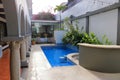 beautiful house swimming pool view from the veranda, summer day Royalty Free Stock Photo