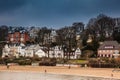 Beautiful houses and beaches on the banks of Elbe river in Hamburg on a cold end of winter day Royalty Free Stock Photo