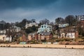 Beautiful houses and beaches on the banks of Elbe river in Hamburg on a cold end of winter day Royalty Free Stock Photo