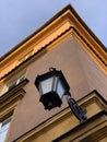 Beautiful houses in the old town in Warsaw. Old lantern. Royalty Free Stock Photo