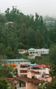 Beautiful houses and trees on the kodaikanal tour place. Royalty Free Stock Photo