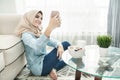 Beautiful housewife wearing hijab taking selfies in a leisure ti Royalty Free Stock Photo