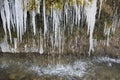 Beautiful and huge icicles in river cascade Royalty Free Stock Photo