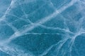 Beautiful ice of Lake Baikal with abstract cracks