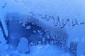 Beautiful ice pattern close-up on winter window glass Royalty Free Stock Photo