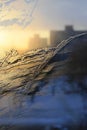 Beautiful ice pattern glowing in sunlight on winter window glass Royalty Free Stock Photo