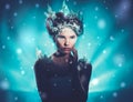 Beautiful ice queen in a falling snow Royalty Free Stock Photo