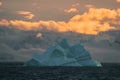 Beautiful iceberg floating in the water. Photo taken at sunset in Antarctica and Arctic Greenland. Global warming and