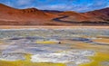 Beautiful icelandic geothermal valley landscape, yellow sulfur deposits, volcanic red mountains, curved empty road - Seltun Royalty Free Stock Photo