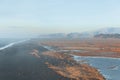 beautiful icelandic landscape with wavy ocean and mountains, vik dyrholaey, reynisfjara