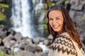 Beautiful Icelandic Woman Smilimng By A Waterfall in Northern Iceland Royalty Free Stock Photo