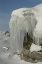 Beautiful icicles on rocks. Royalty Free Stock Photo