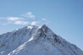 Beautiful iconic landscape Winter image of Stob Dearg Buachaille Etive Mor mountain in Scottish Highlands againstd vibrant blue Royalty Free Stock Photo