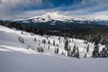 Beautiful icy landscape, cloudy sky and frozen snow-capped mountains. Royalty Free Stock Photo