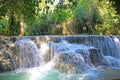 Beautiful idyllic calm quiet green jungle forest landscape with waterfall step rock cascade - Kuang Si, Luang Prabang, Laos