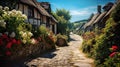 Beautiful idyllic old English village street with cottages made of stone and front gardens with flowers Royalty Free Stock Photo
