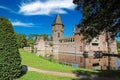 Beautiful idyllic scenic green garden park, romantic medieval dutch moated water castle - Kasteel Heeswijk, Netherlands Royalty Free Stock Photo