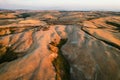 Beautiful idyllic sunny late summer landscape of Toscana with house, hills, trees and fields.