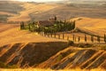 Beautiful idyllic sunny late summer landscape of Toscana with house, hills, trees and fields. Royalty Free Stock Photo