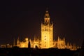 Beautiful, illuminated cathedral of Giralda at night in Seville, Spain Royalty Free Stock Photo