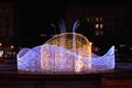 Beautiful illuminated Christmas installation in the center of Magdeburg, Germany at night