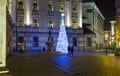 Beautiful illuminated Christmas tree on University square of Wroclaw at night time. Wroclaw Royalty Free Stock Photo