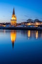 beautiful illuminated cityscape of the old harbor of La Rochelle