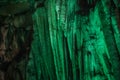 Beautiful illuminated limestone stalactites in Adygeya underground cave