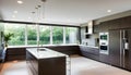 A contemporary kitchen is sleek and spotless