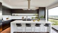 A contemporary kitchen is sleek and spotless