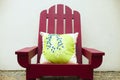 image of charming purple wooden armchair with green pillow Royalty Free Stock Photo